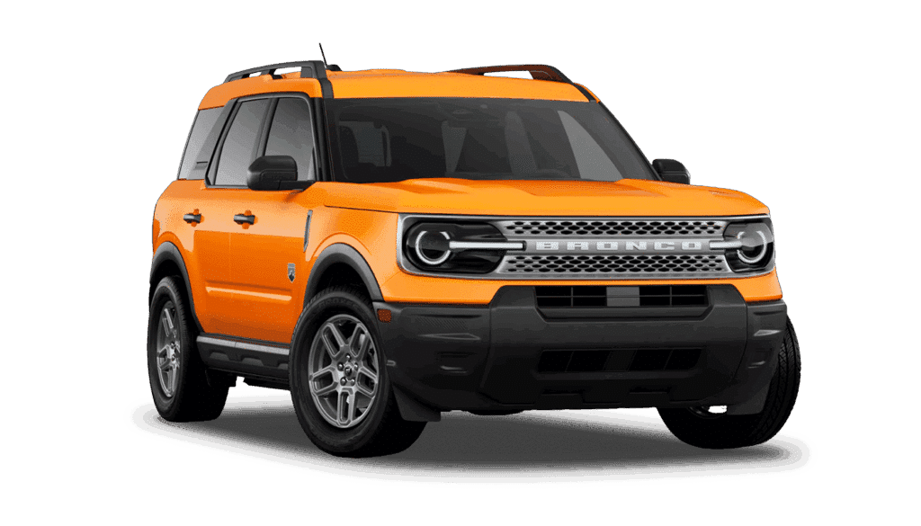 SUV orange moderne avec design robuste, grille avant distinctive et roues alliage, idéal pour l'aventure.