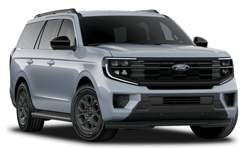 SUV Ford Expedition gris métallisé, design robuste et moderne avec une calandre noire imposante.